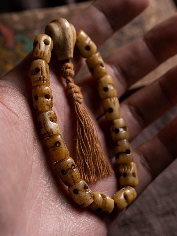 Hand Carved Citipati Lord of the Cemetery Single Strand Mala Bracelet Natural Aged Wild Yak Bone Skull Prayer Bead Bracelet Handcrafted Vintage Tibetan Style Yak Bone Wrist Bracelet