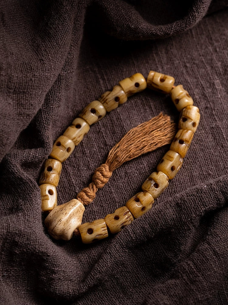 Hand Carved Citipati Lord of the Cemetery Single Strand Mala Bracelet Natural Aged Wild Yak Bone Skull Prayer Bead Bracelet Handcrafted Vintage Tibetan Style Yak Bone Wrist Bracelet